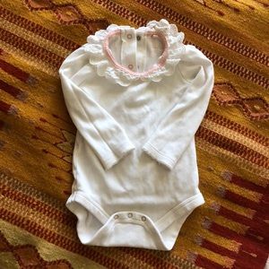 Lace collar onesie from Baby Boden